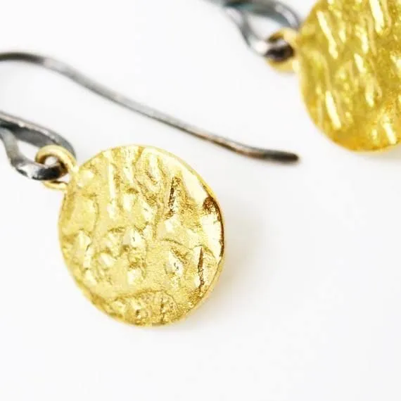 Gold plated brass discs earrings with texture and hangs on sterling silver oxidized hook